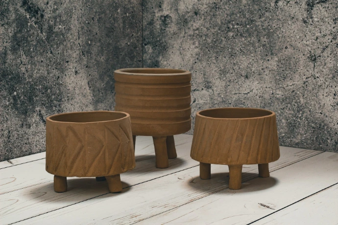 brown wooden round table on white wooden floor